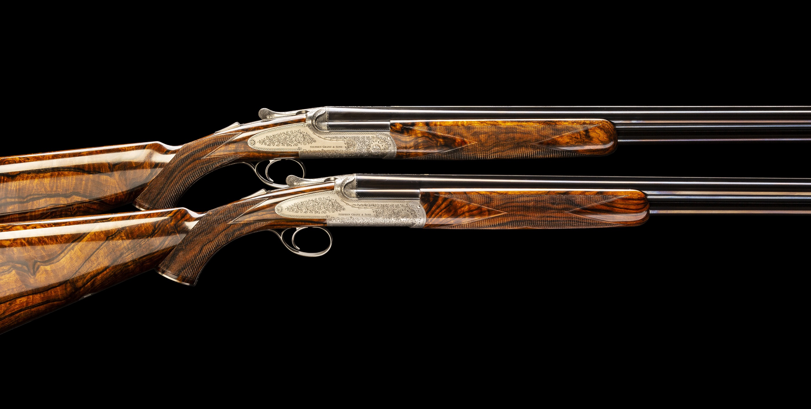 Pair of 20 bore Stephen Grant Round Action Over & Unders