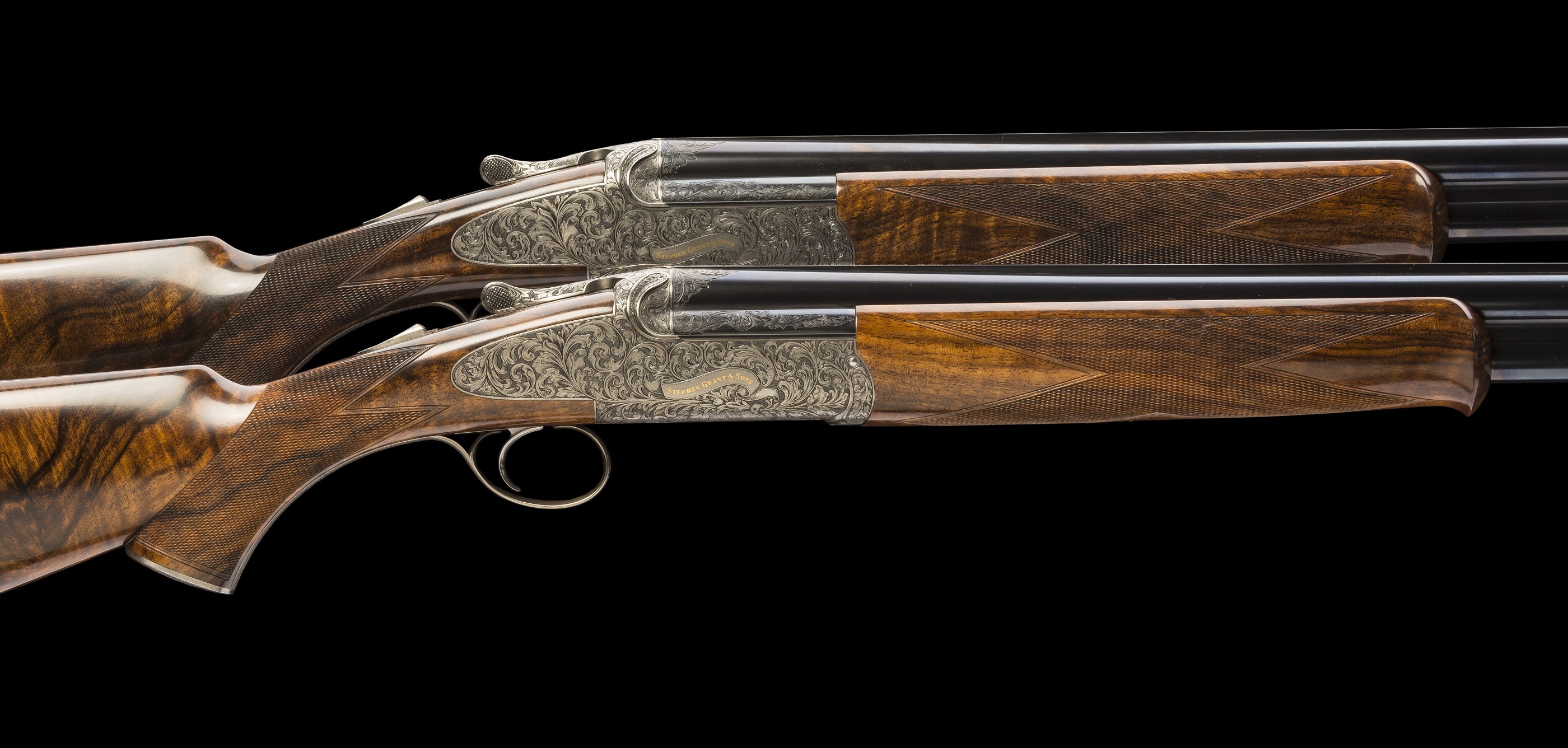 Pair of 12 bore Stephen Grant Round Action Over & Unders